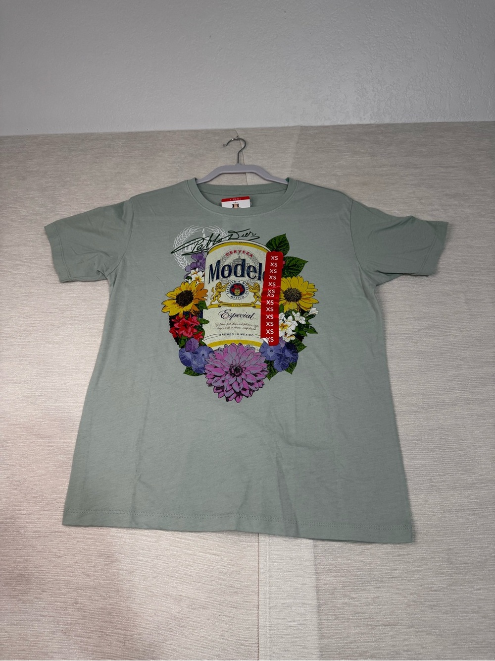 ModelCo Sage Green Tee with Colorful Floral Modelo Label